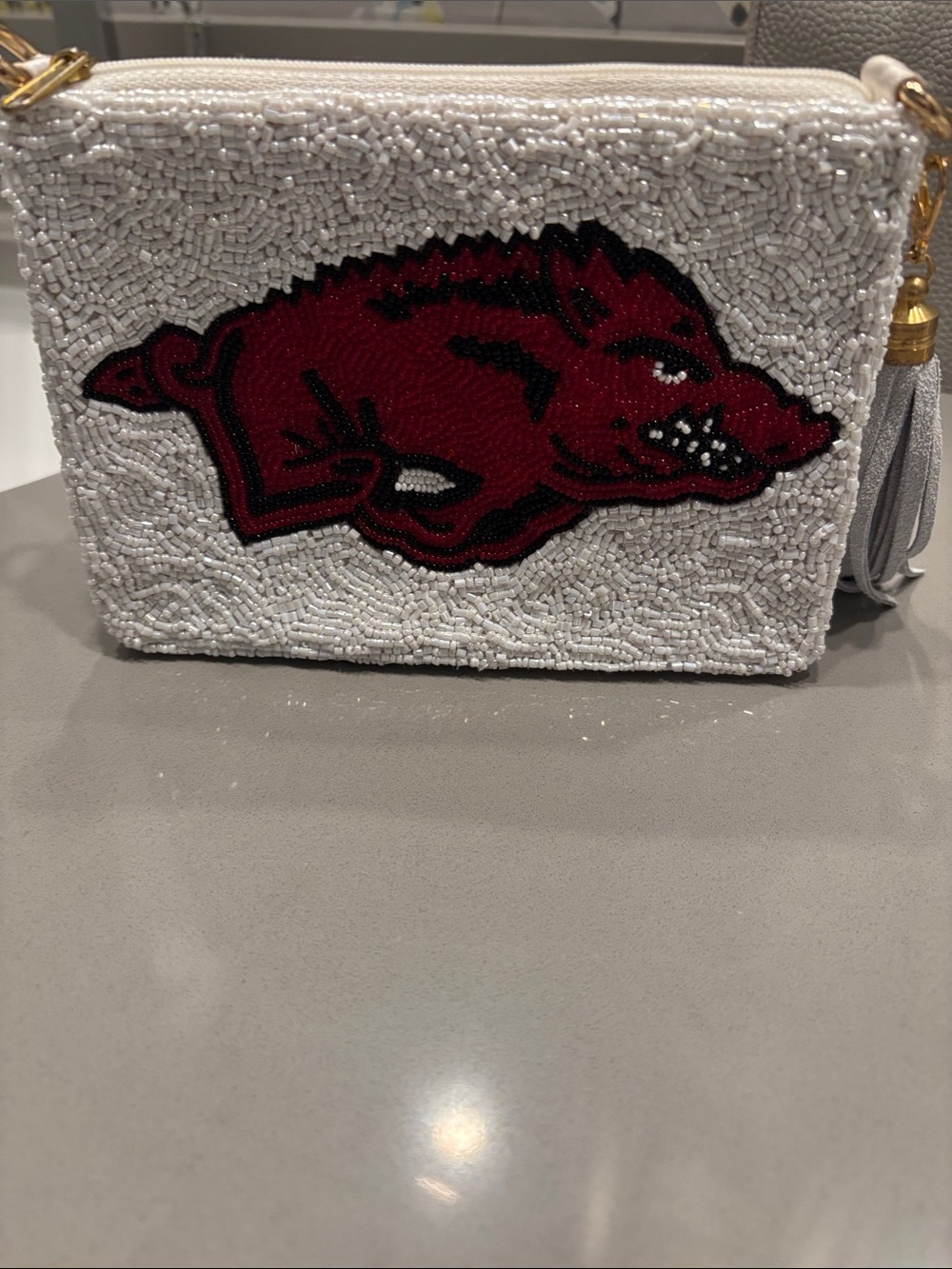 Moyna White Beaded bag with Red Razorback Motif..it doesn’t have a strap